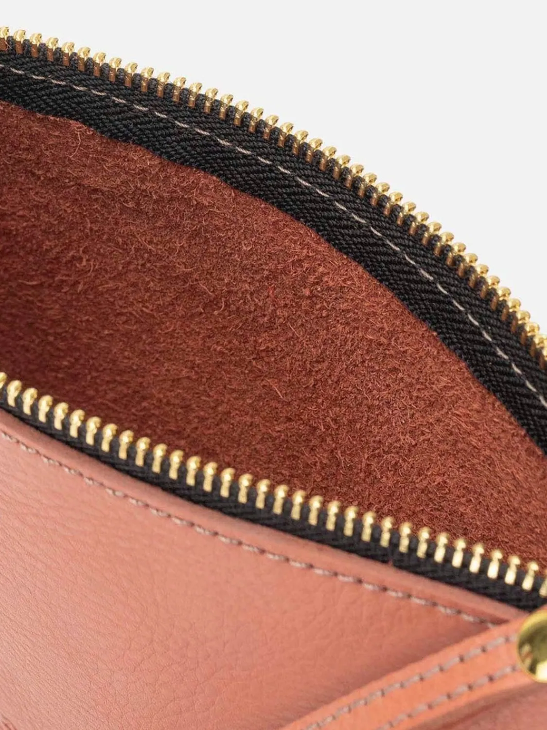 zipper_terracota_1.webp Mercules Pequeños | Zipper Terracota